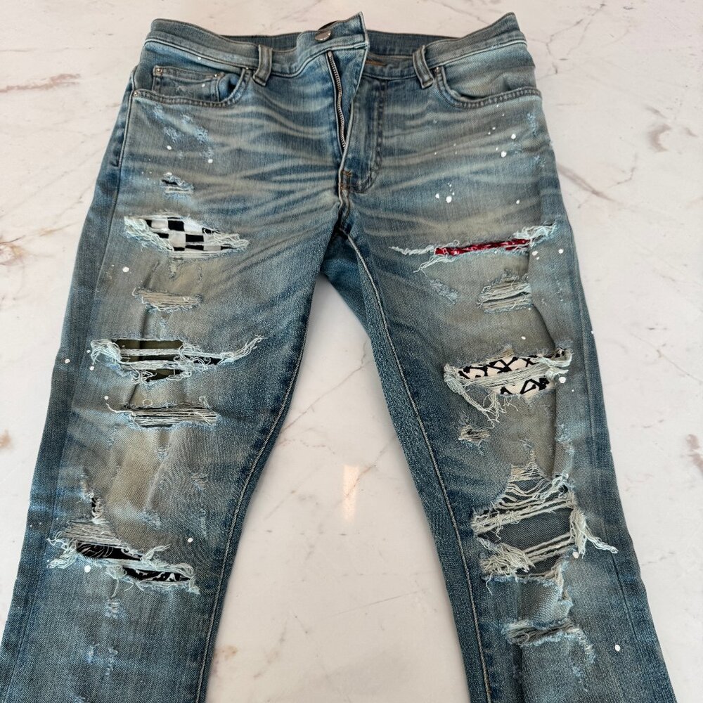 AMIRI distressed bandana patch work thrasher jeans